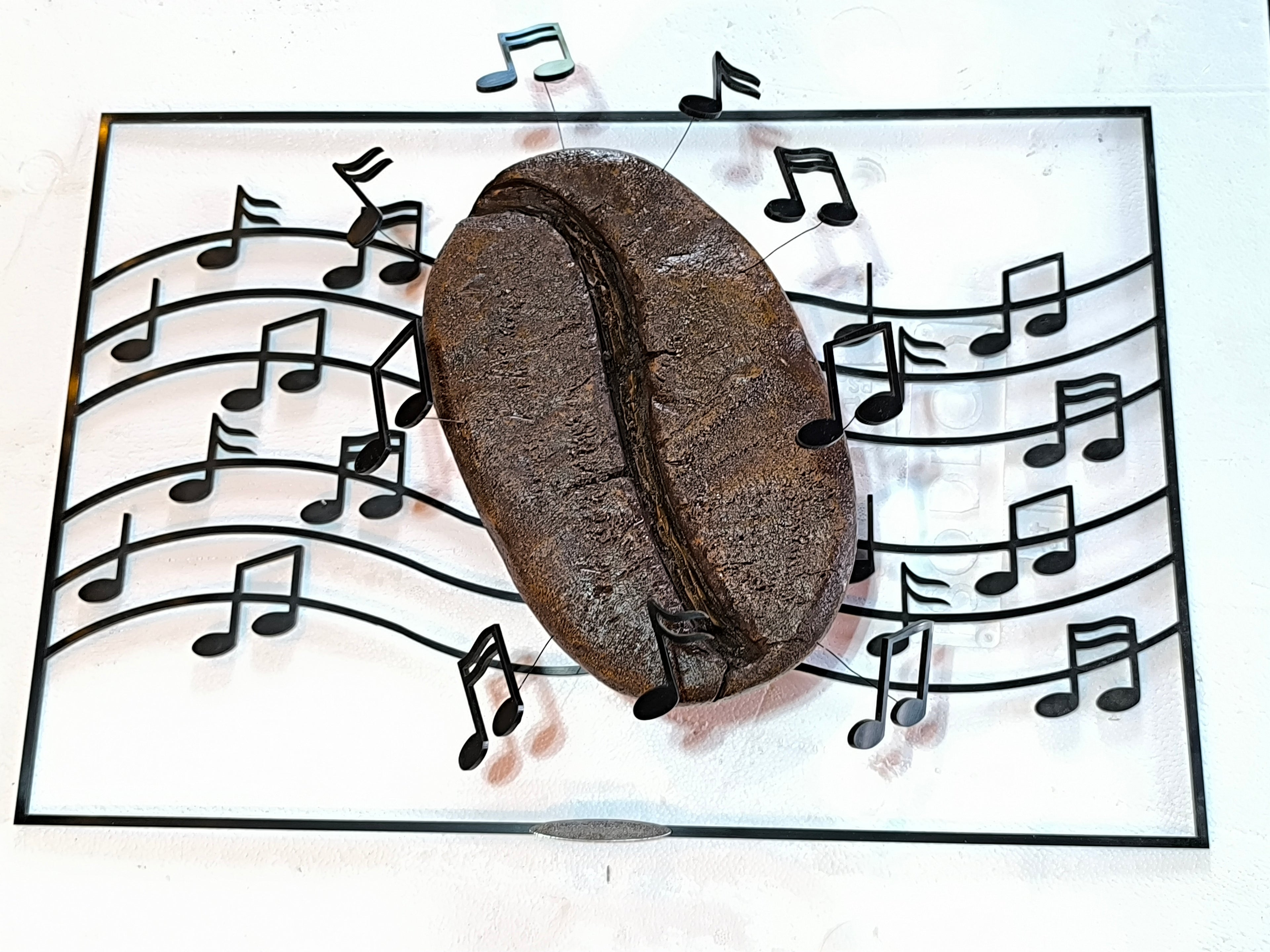 Muzieknoten kunstwerk koffieboon