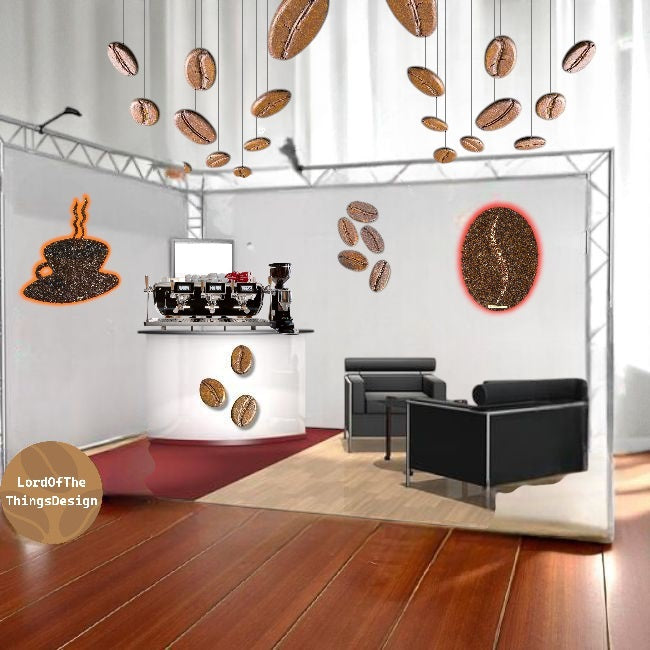 beursstand met opgehangen reuzen koffiebonen door Lord Of The Things Design