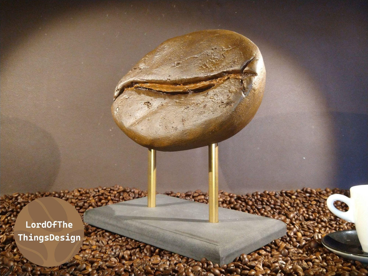 koffieboon sculptuur goud